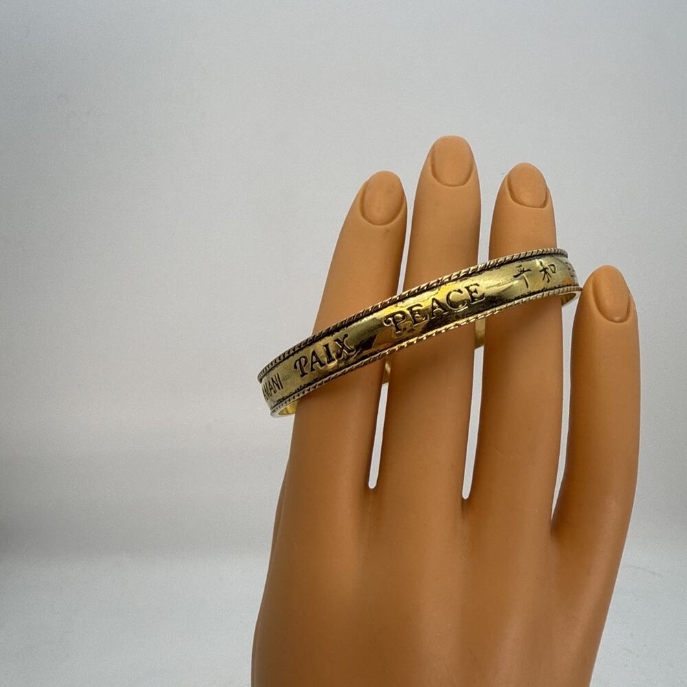 Vintage Avon Peace Bracelet Bangle Gold Tone Multi Language Engraved Textured